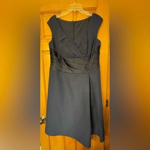 Navy dress, knee length.